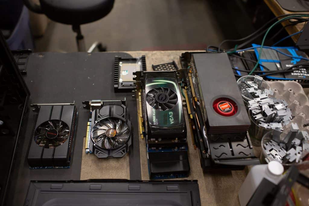 computer fans displayed on a desk for repair