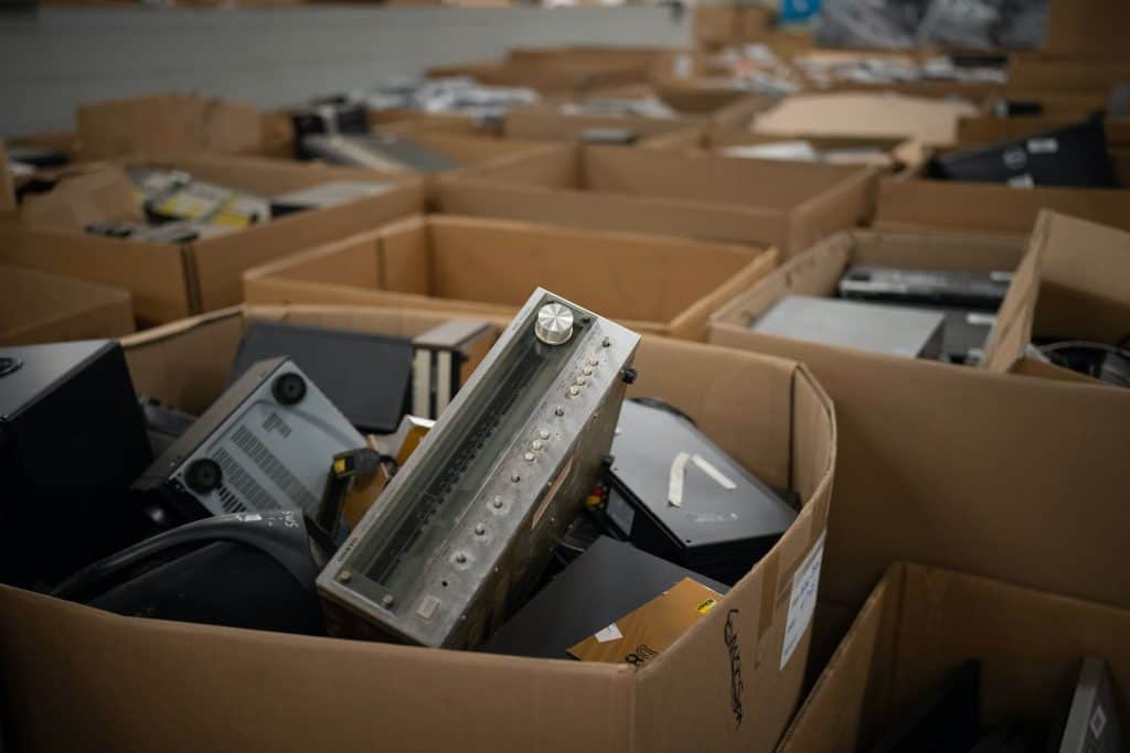 Boxes and boxes with discarded consumer electronics await further processing at Repowered